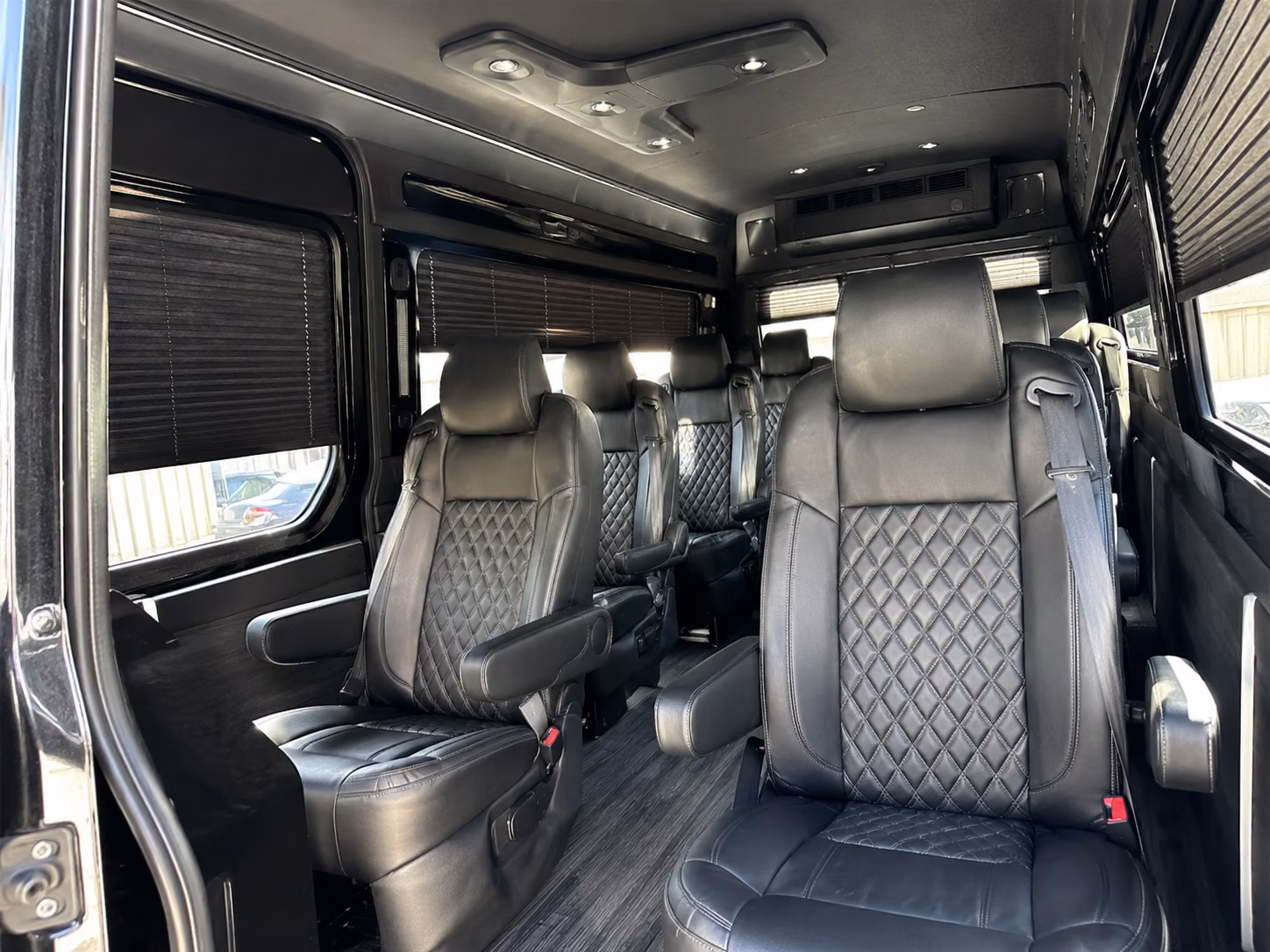 queens sprinter van with driver inside